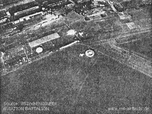 Aerial view of field marker. Also shows area of control tower - top of photo