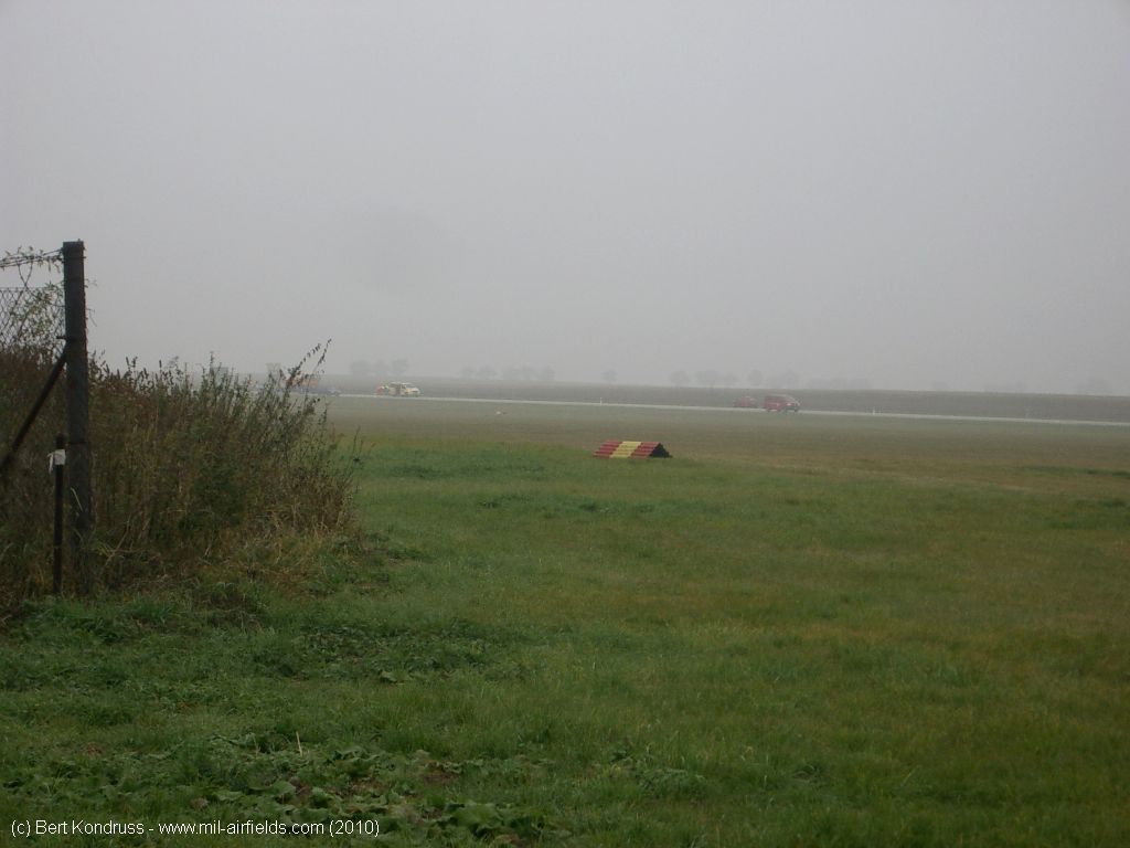 View of the runway, in the background the motorway