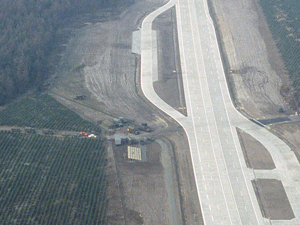 Detail view with road, mobile control tower and viewing platform.