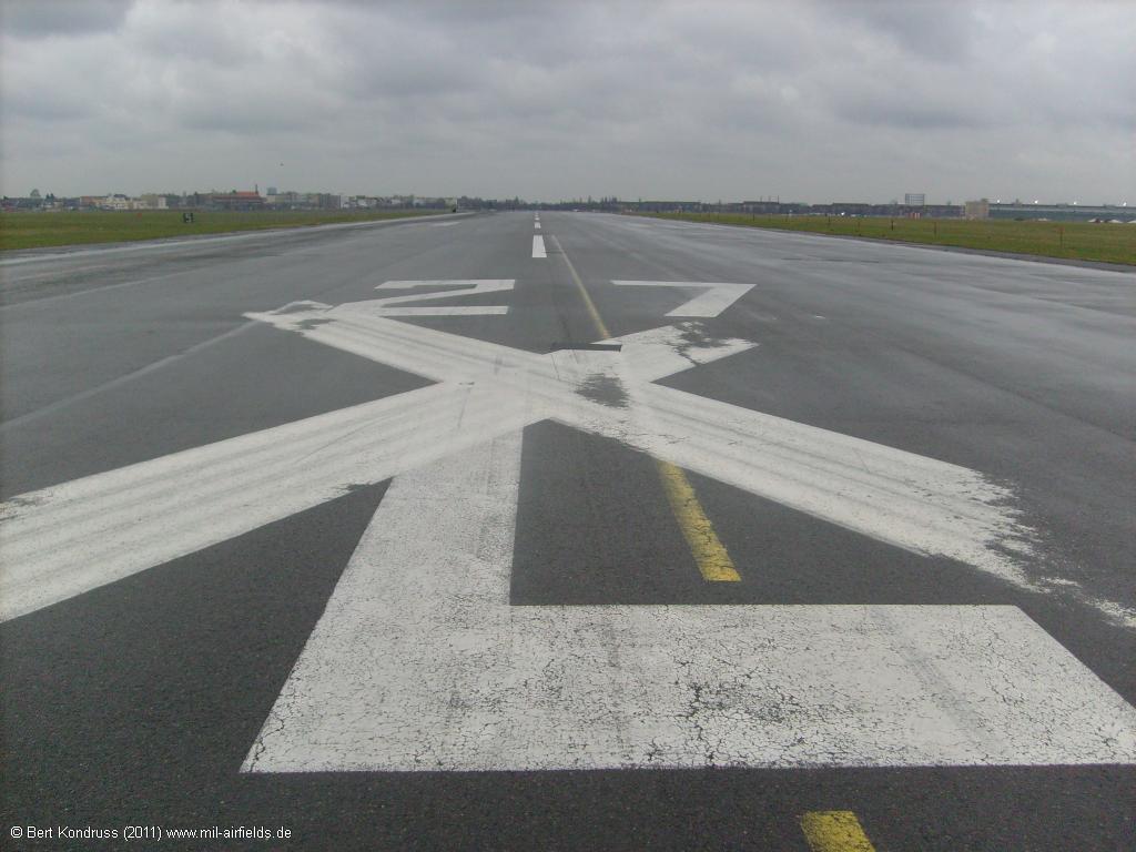 The runway is marked as closed by white crosses