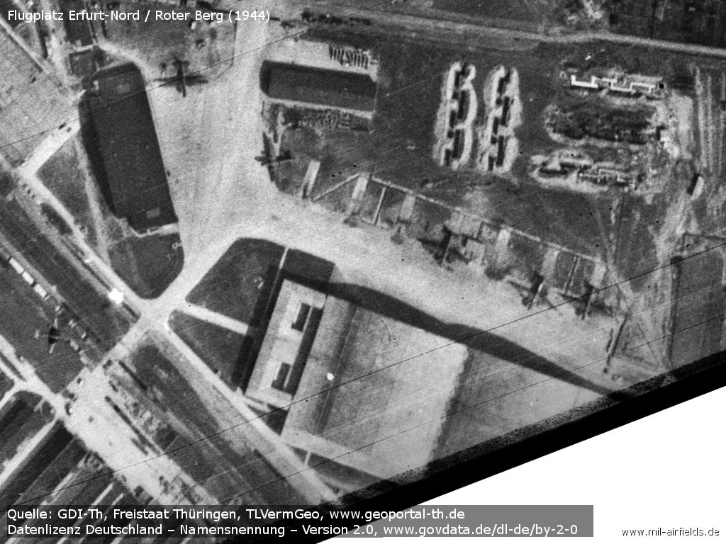 Repair shop with hangar and parked aircraft at Erfurt, Germany